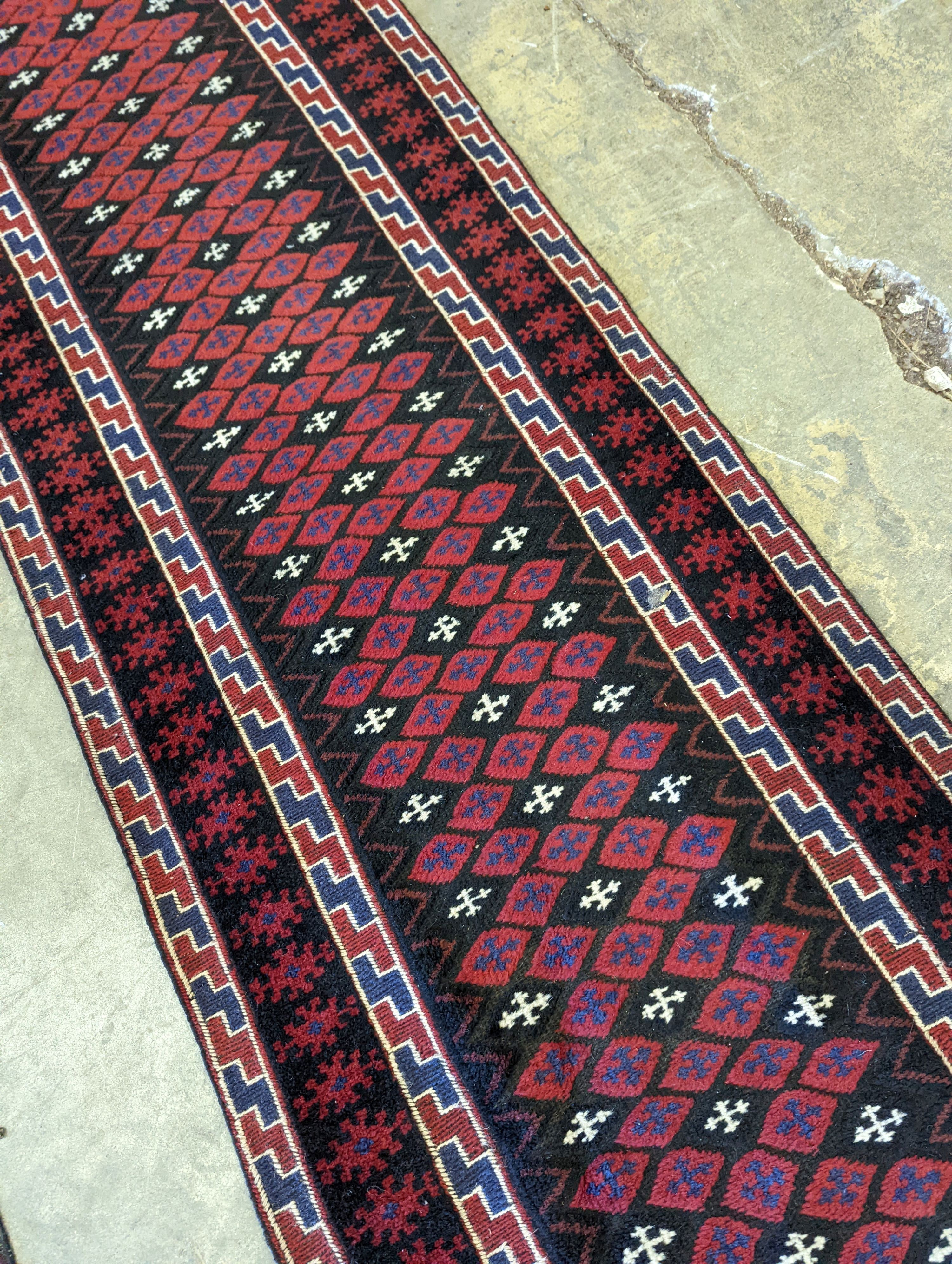 A Kilim flat weave runner, 290 x 62cm